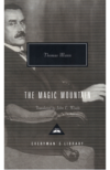 Thomas Mann seated in a chair with intense gaze, on cream-colored Everyman's Library edition of The Magic Mountain.